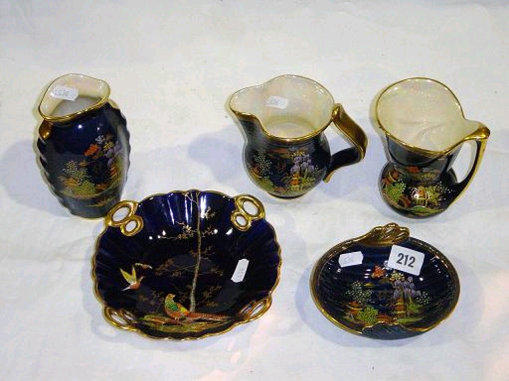 Appraisal: A collection of Crown Devon blue ground wares comprising jugs