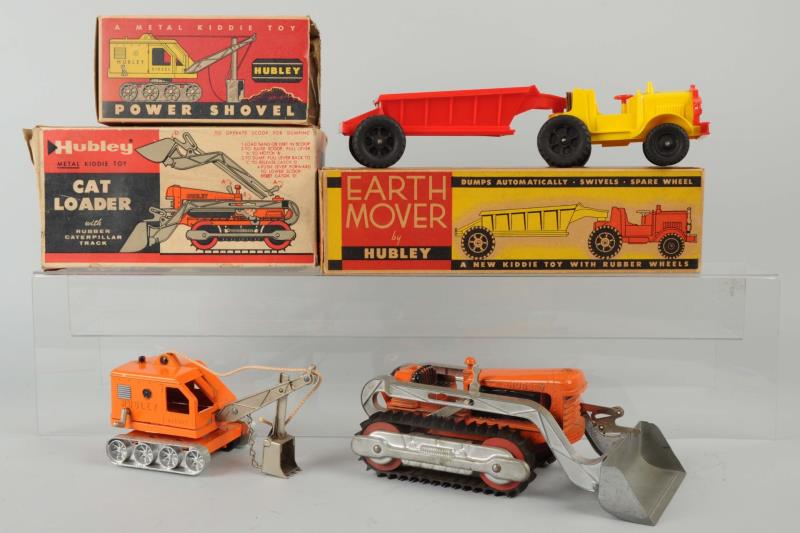 Appraisal: Lot Of Hubley Toys Includes earth mover cat loader and