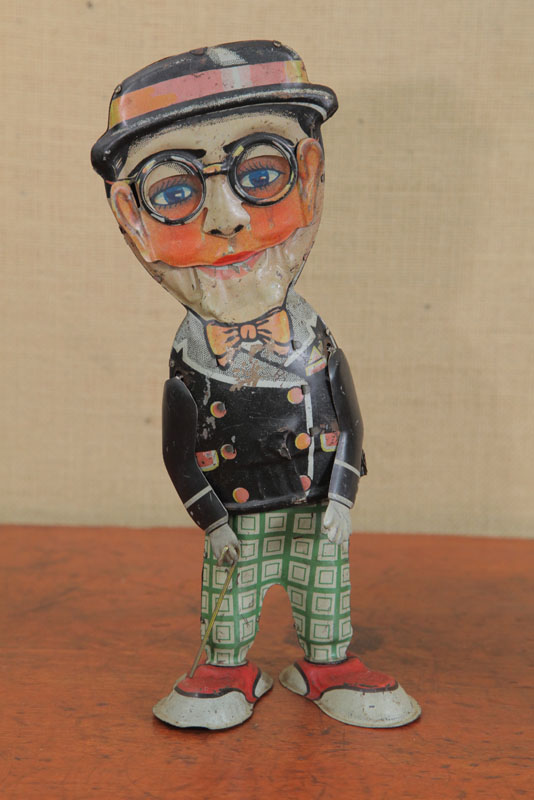 Appraisal: TIN WIND UP TOY Marx lithographed Harold Lloyd walker with