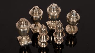 Appraisal: A pair of Victorian silver pepper pots George Unite Birmingham