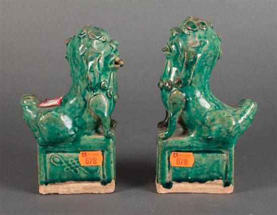 Appraisal: Pair of Chinese blue glazed foo lion roof tiles in