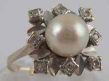 Appraisal: A white metal tests carat gold cultured pearl and diamond