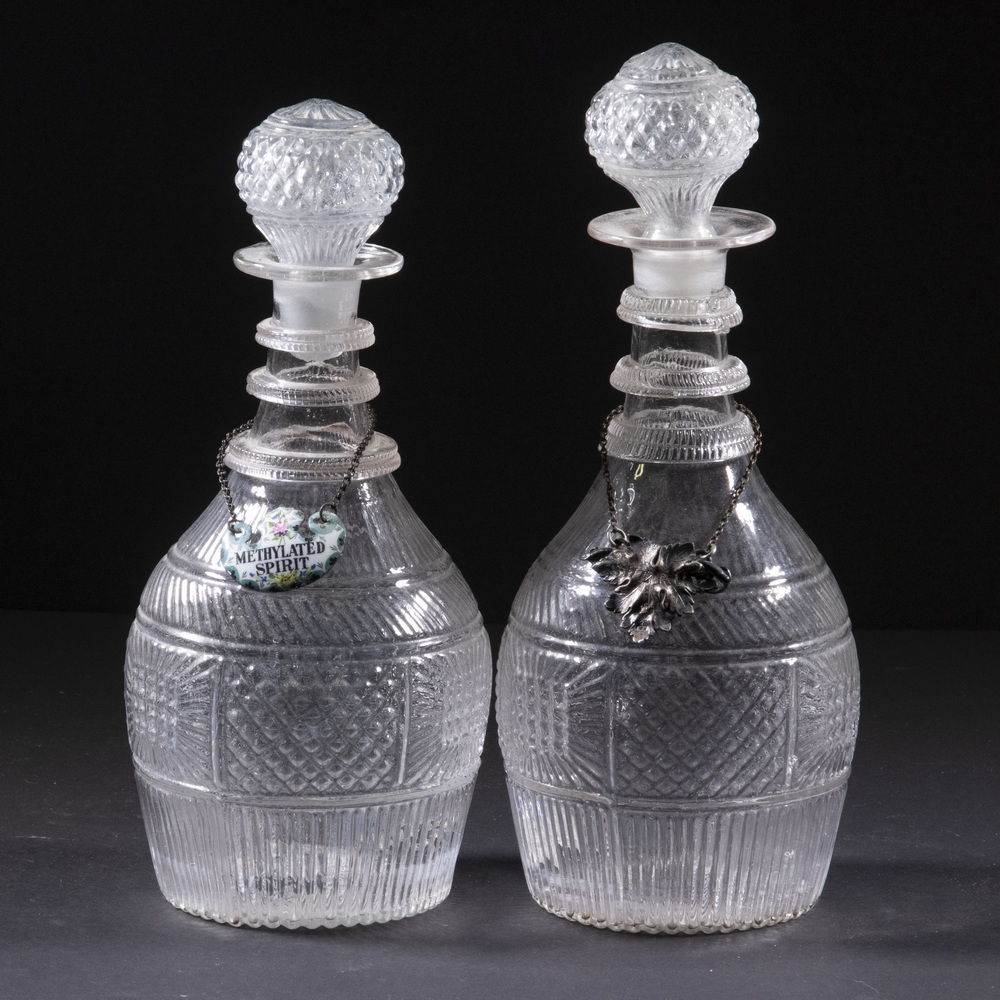 Appraisal: EARLY THREE-MOLD BLOWN GLASS DECANTERS Pair of Early th c