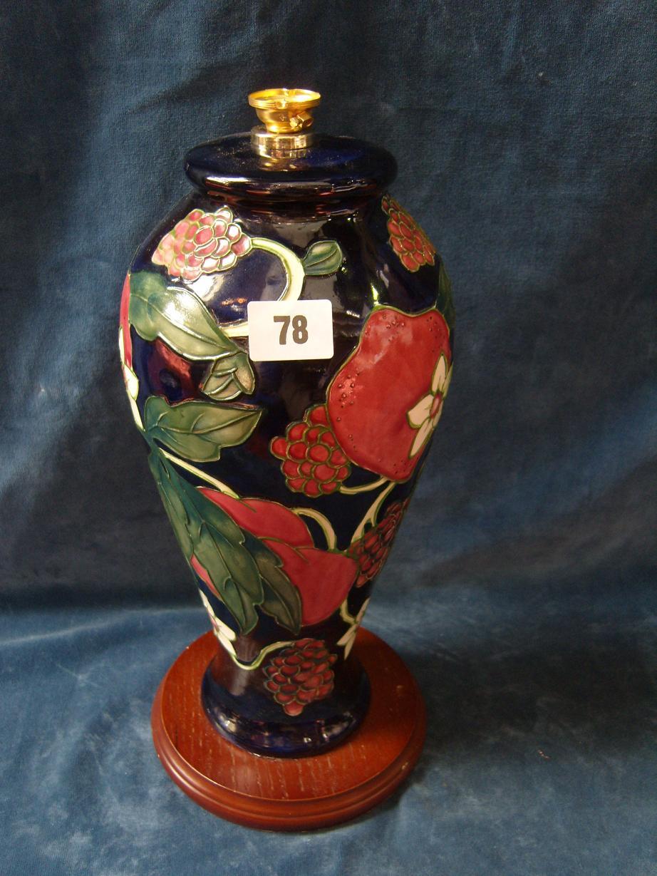 Appraisal: A blue ground Moorcroft lamp base with trailing leaf and