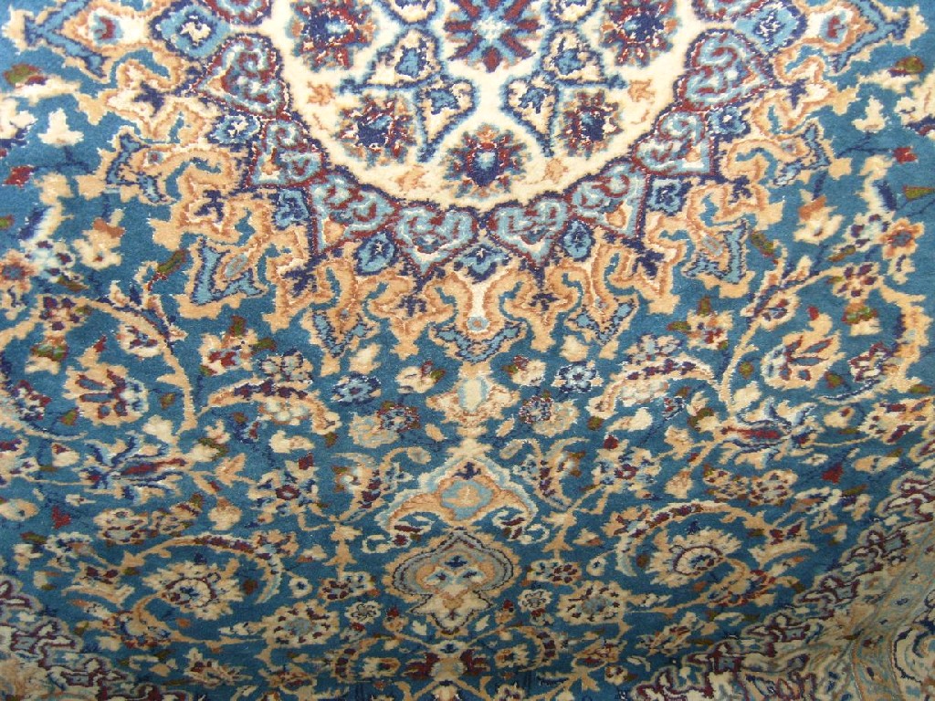 Appraisal: A good quality Persian wool carpet with circular white ground