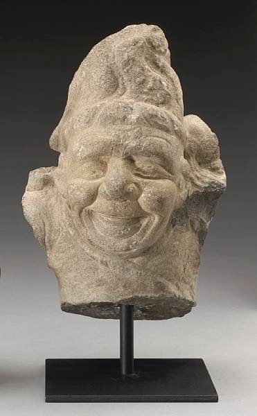 Appraisal: A stone sculpture fragment Tang Dynasty or Later Carved as