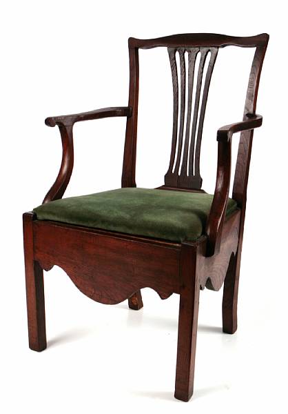 Appraisal: A George III oak and elm commode armchair height in