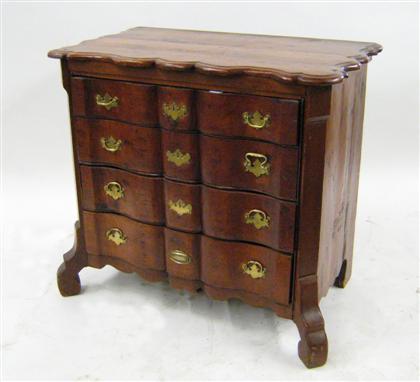 Appraisal: Continental stained pine chest of drawers The shaped top above