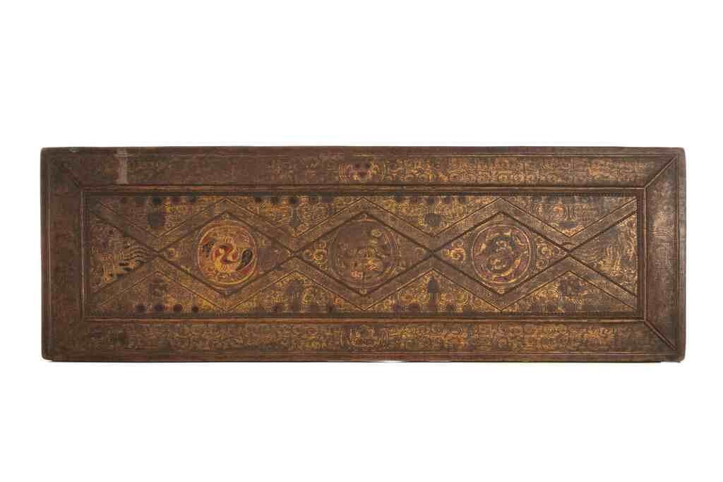 Appraisal: Tibetan th c manuscript cover carved with lightly etched lozenge