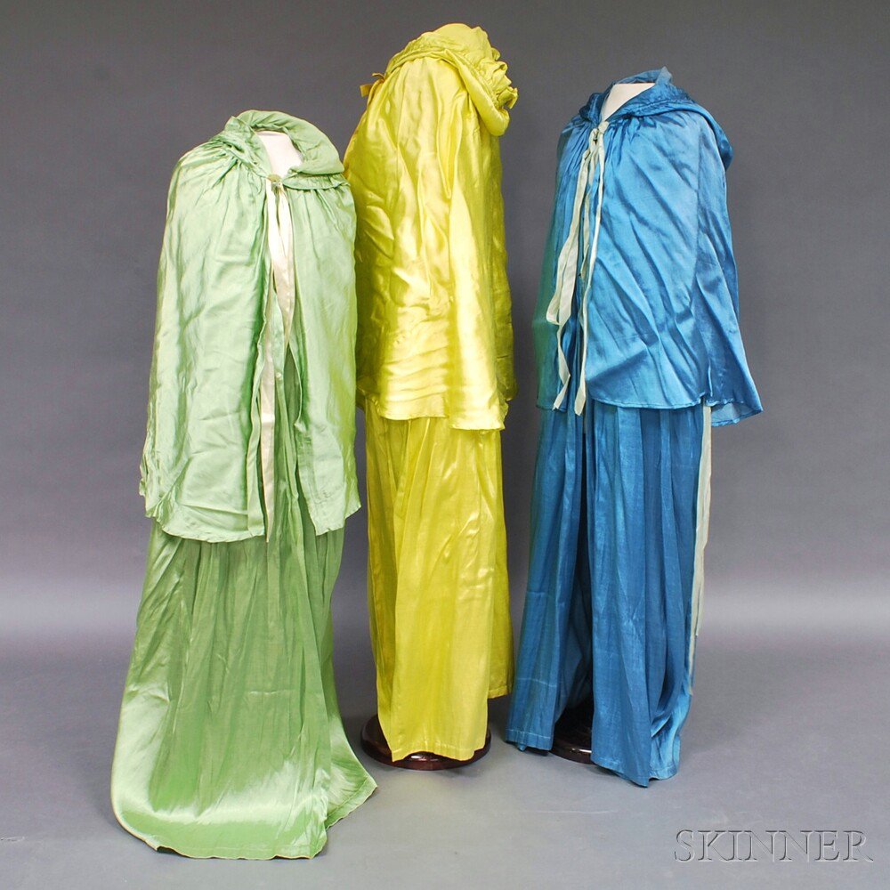 Appraisal: Three Leon Bakst Satin and Rayon Hooded Capes America -