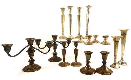 Appraisal: STERLING Weighted candlesticks fourteen pieces two Gorham three-light candelabras gardooning