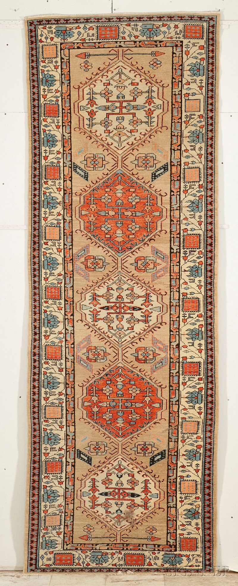 Appraisal: Caucasian Long Rug with camel-colored field and five red and