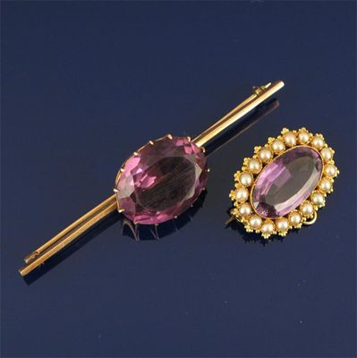 Appraisal: An oval shaped amethyst set gold bar brooch and an