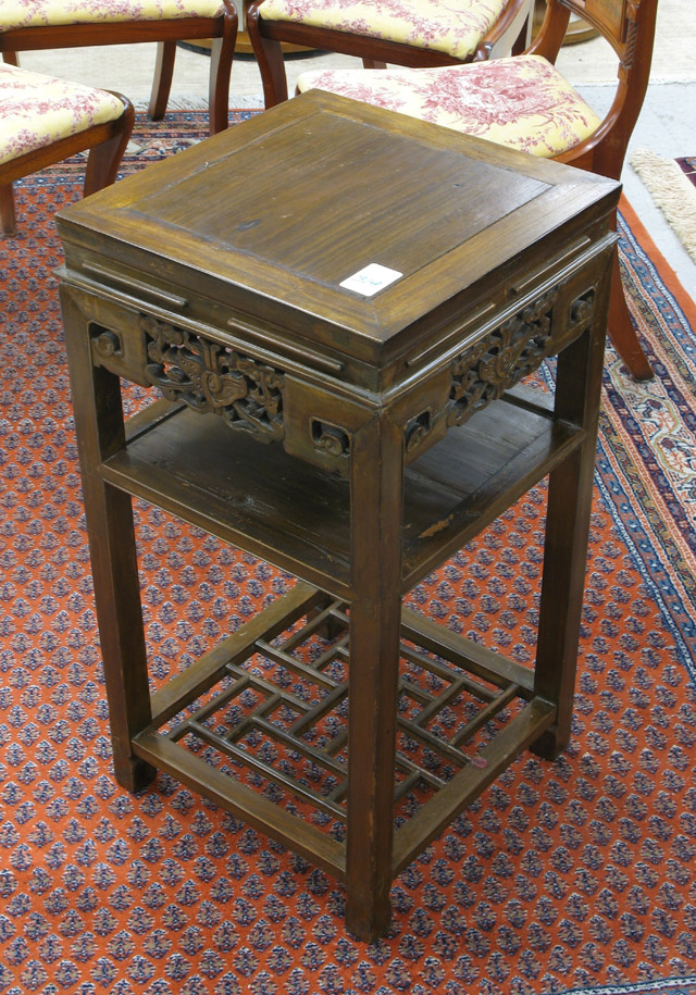 Appraisal: CHINESE CARVED WOOD PEDESTAL TABLE having a square top carved