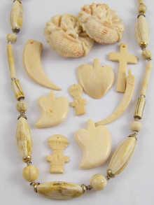 Appraisal: A quantity of carved ivory jewellery including an ivory necklace