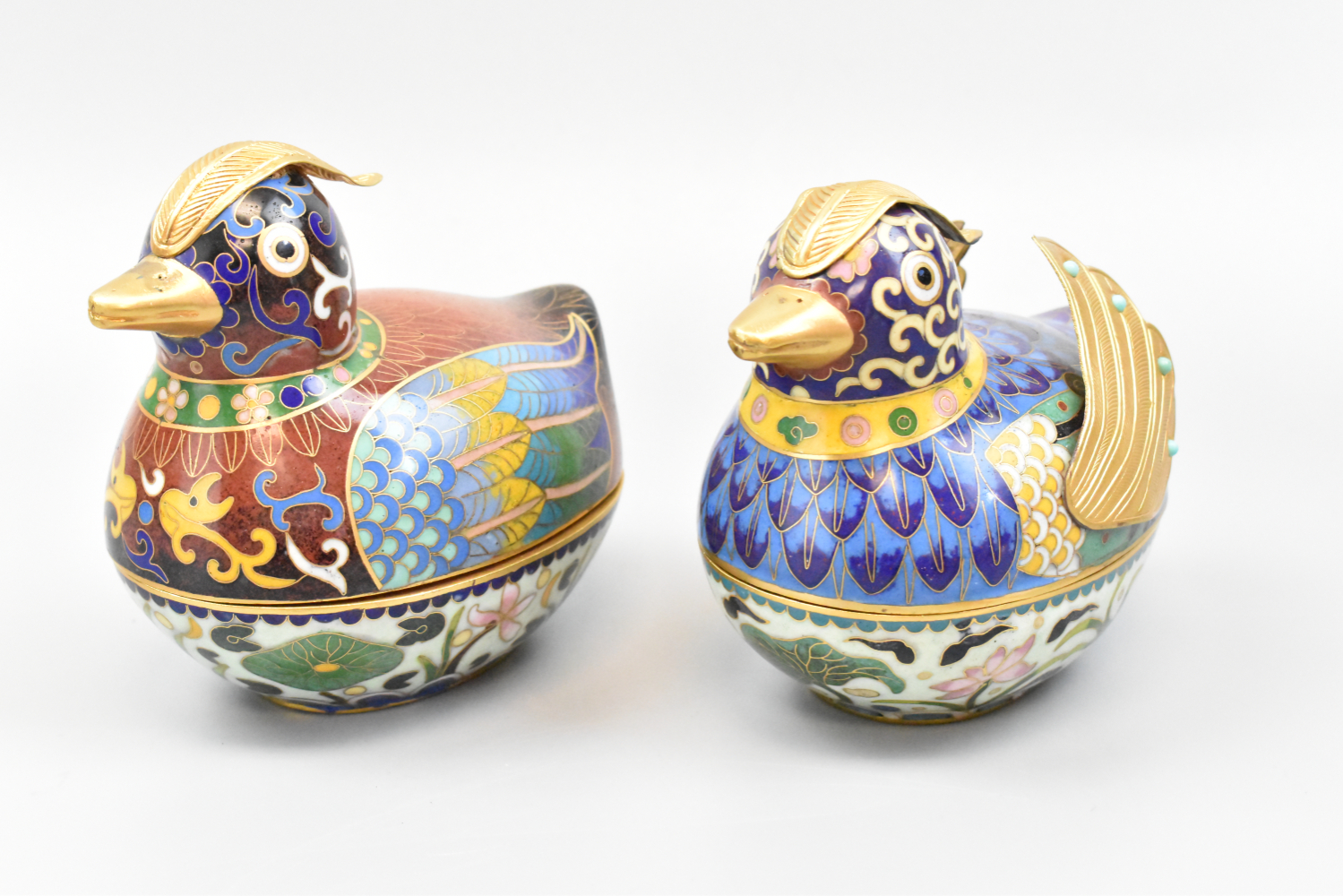 Appraisal: A pair of Chinese cloisonne ducks as covered boxes The