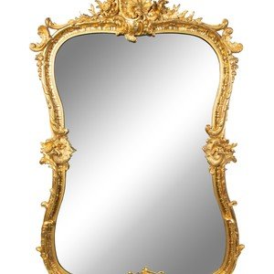 Appraisal: A Louis XV Style Giltwood Mirror TH CENTURY having shaped