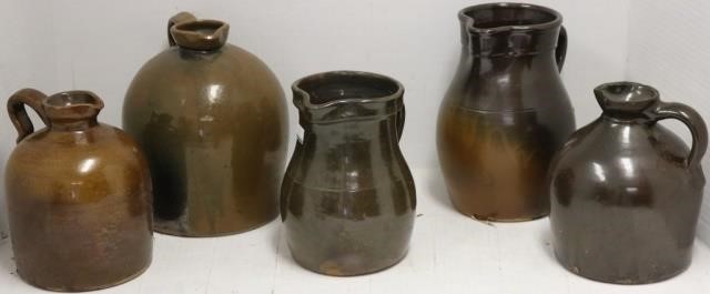 Appraisal: PIECES OF BROWN STONEWARE TO INCLUDE SYRUPJUGS AND PITCHERS TO