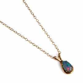 Appraisal: A ct gold opal triplet pendant on a gold plated