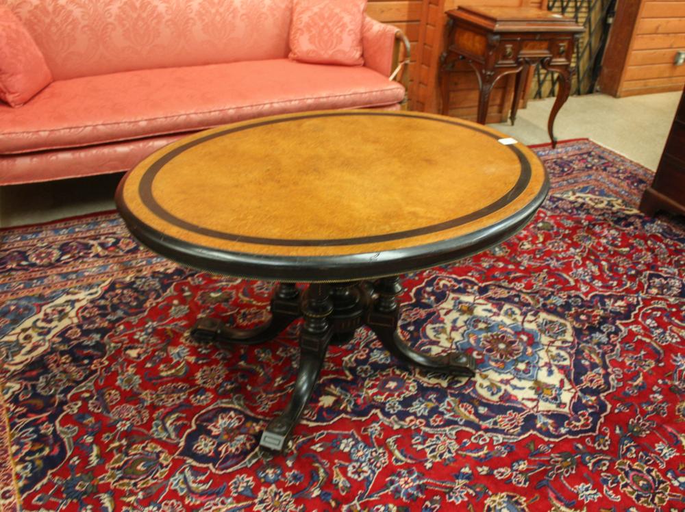 Appraisal: VICTORIAN AESTHETIC MOVEMENT TILT-TOP LOO TABLE English c ebonized walnut