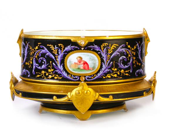 Appraisal: A parcel gilt and painted porcelain oval jardiniere height in