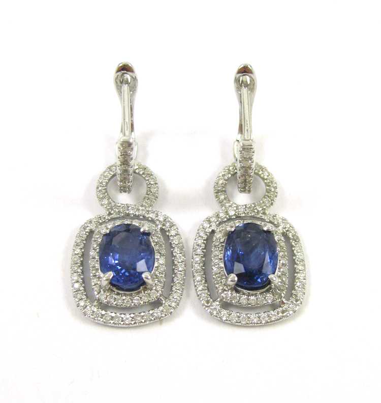 Appraisal: PAIR OF SAPPHIRE AND DIAMOND DANGLE EARRINGS each k white