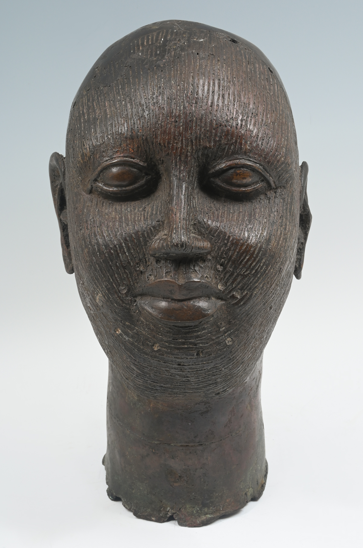 Appraisal: NIGERIAN BENIN LOST WAX BRONZE HEAD Benin bronze head of