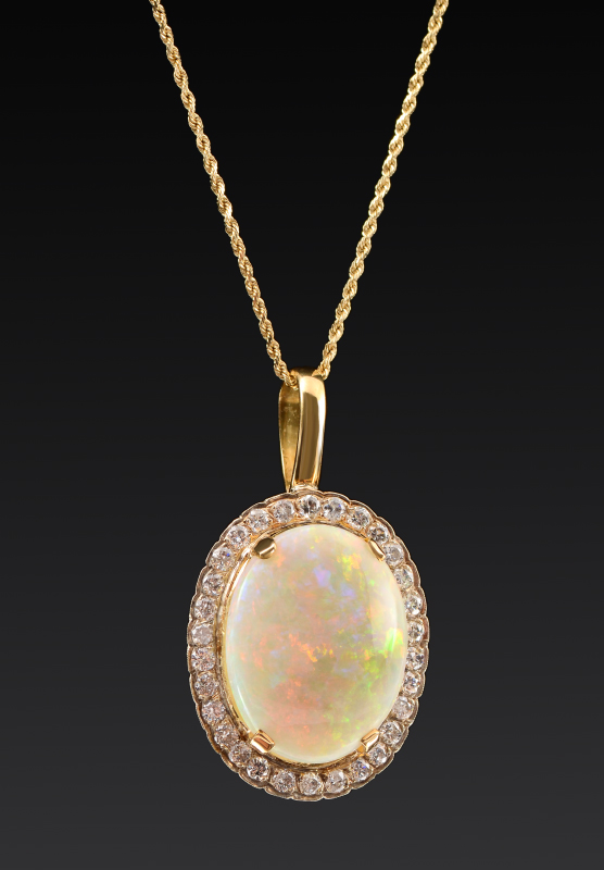 Appraisal: CT OPAL PENDANT NECKLACE WITH DIAMONDS k yellow gold pendant