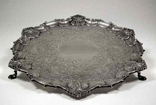 Appraisal: An Edward VII silver circular salver with shaped scroll and