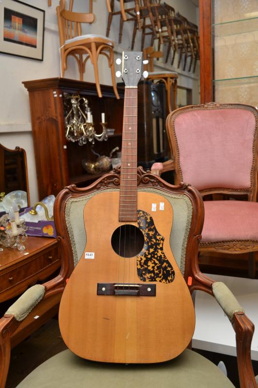 Appraisal: A FOUR STRING TENOR GUITAR A FOUR STRING TENOR GUITAR