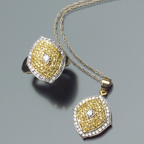 Appraisal: Yellow diamond pave ring and matching pendant with white diamond