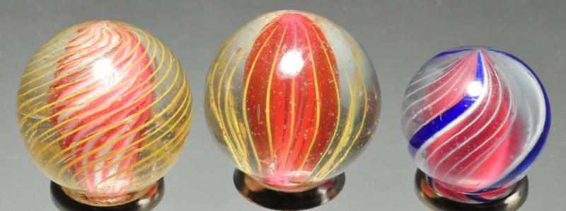 Appraisal: Lot of Small Swirl Marbles Description Includes one three stage