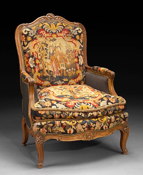 Appraisal: A Baroque style needlepoint upholstered armchair height in width in