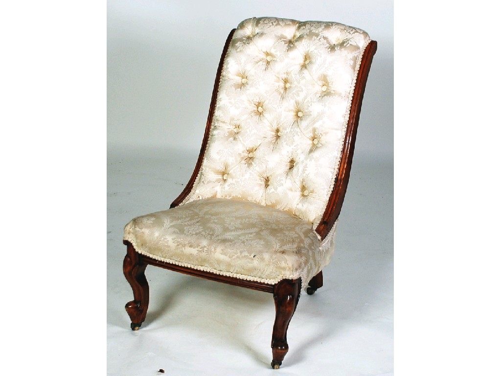 Appraisal: VICTORIAN CARVED BEECH NURSING CHAIR the sloping deep buttoned back