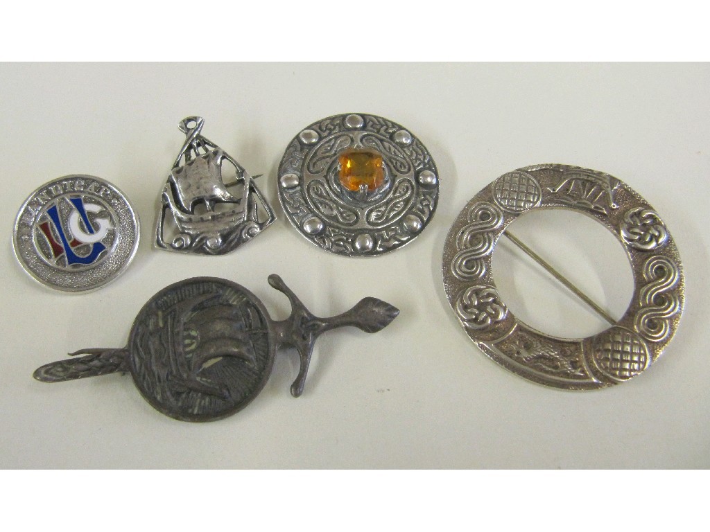 Appraisal: Four Celtic silver brooches and one other silver brooch