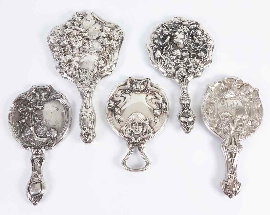 Appraisal: ART NOUVEAU SILVER MIRRORS To include Girl's head at bottom