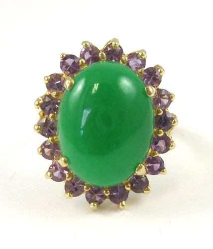 Appraisal: JADE AMETHYST AND FOURTEEN KARAT GOLD RING with round-cut purple