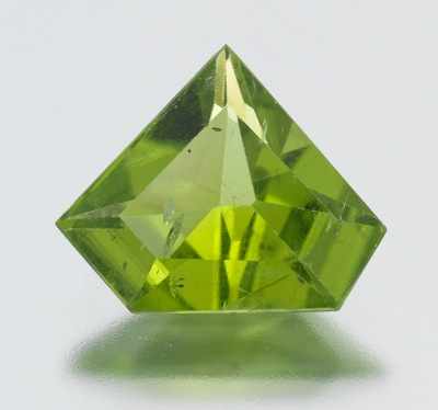 Appraisal: An Unmounted Carat Peridot Pentagon cut peridot weighing ct measuring