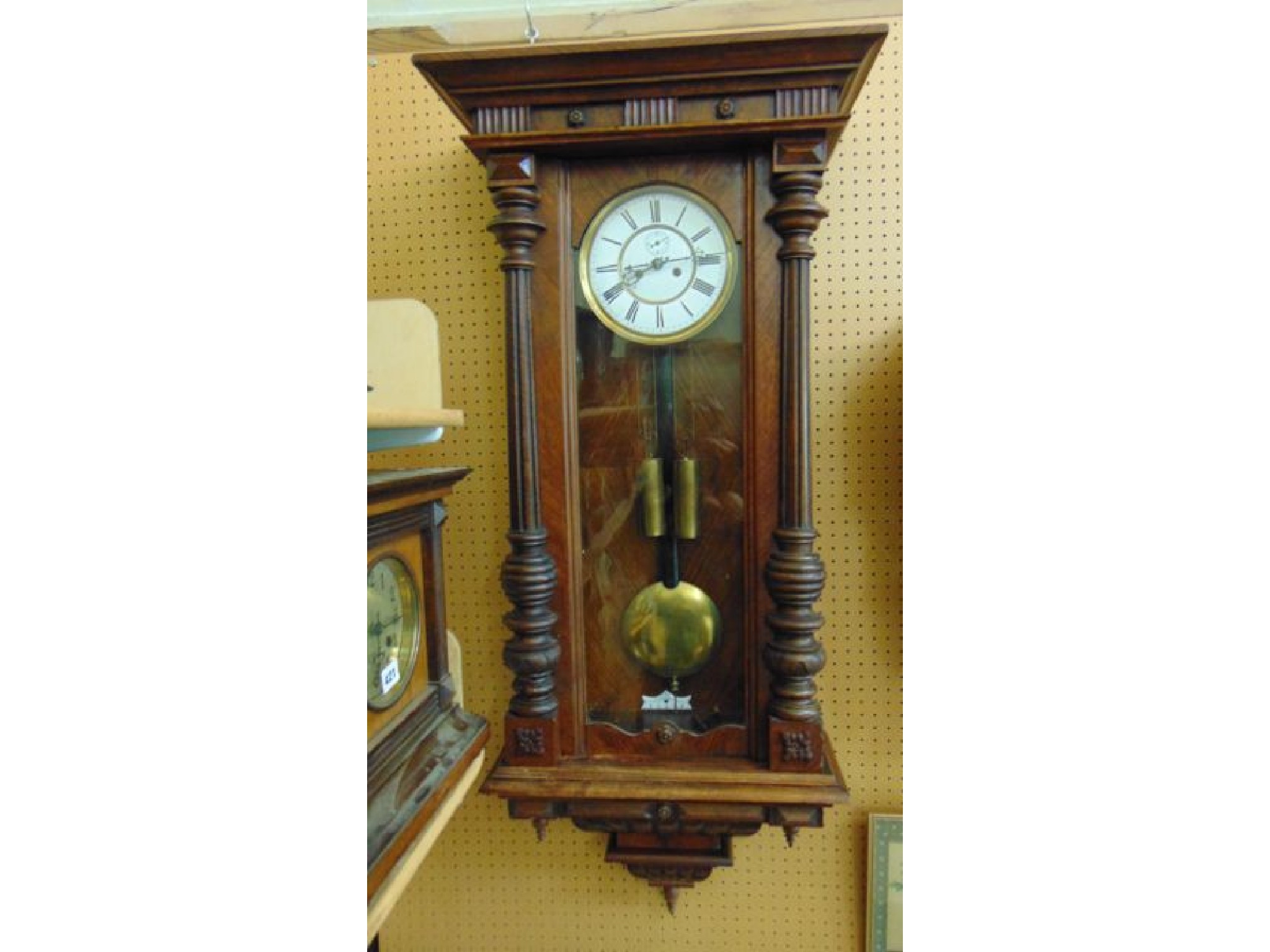 Appraisal: A th century Vienna regulator style wall clock with walnut