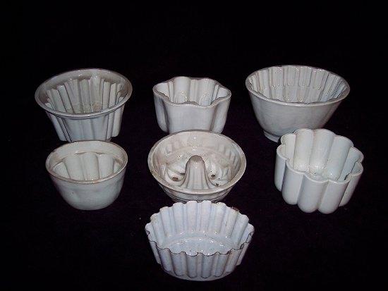 Appraisal: Six jelly moulds various and an enamel mould