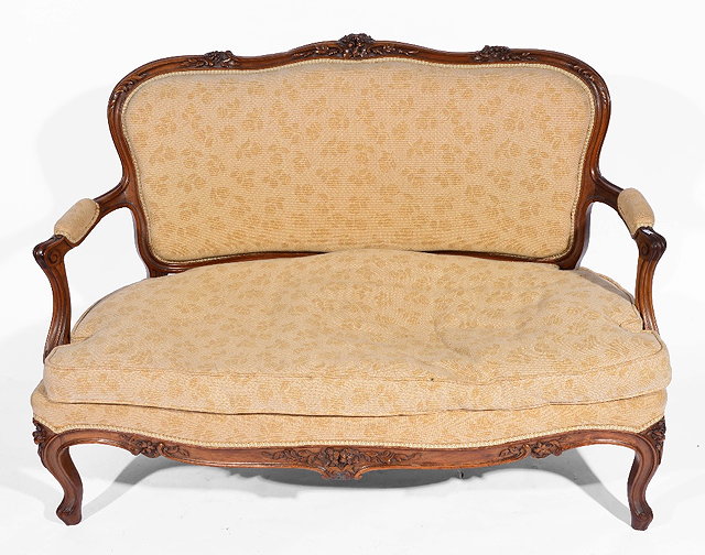 Appraisal: French carved walnut sofacirca with carved back and cabriole supports