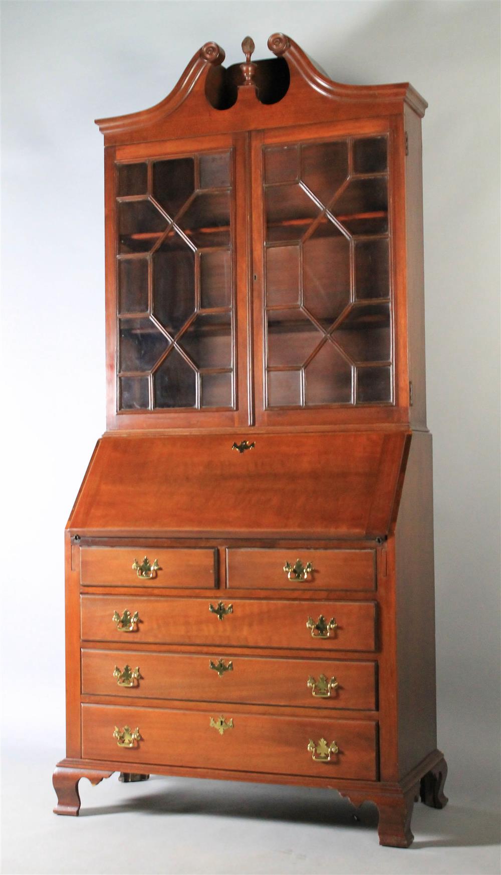 Appraisal: CHIPPENDALE STYLE WALNUT SECRETARY BOOKCASE in two parts the upper