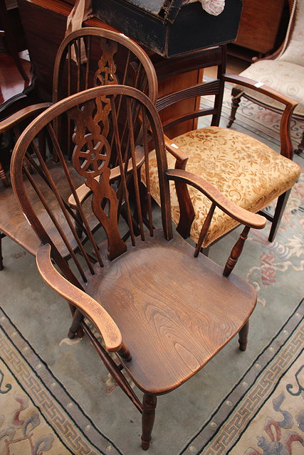 Appraisal: AN EDWARDIAN CIRCULAR OCCASIONAL TABLE a side cabinet with two