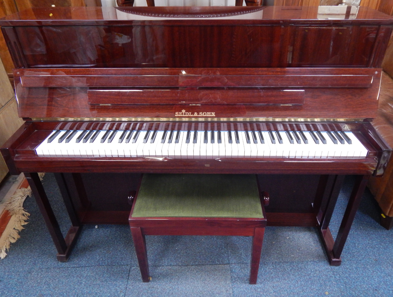 Appraisal: A Seidl Sohn mahogany cased overstrung upright piano cm long