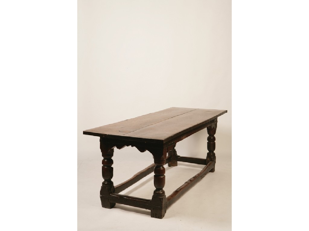 Appraisal: A CHARLES II OAK REFECTORY TABLE the rectangular two plank