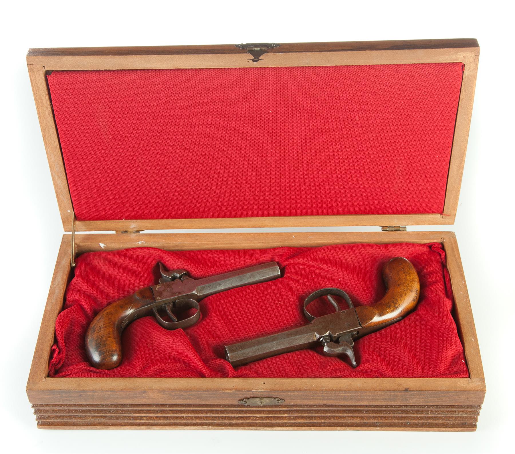 Appraisal: NEAR PAIR OF PISTOLS IN BOX Late th century Hardwood