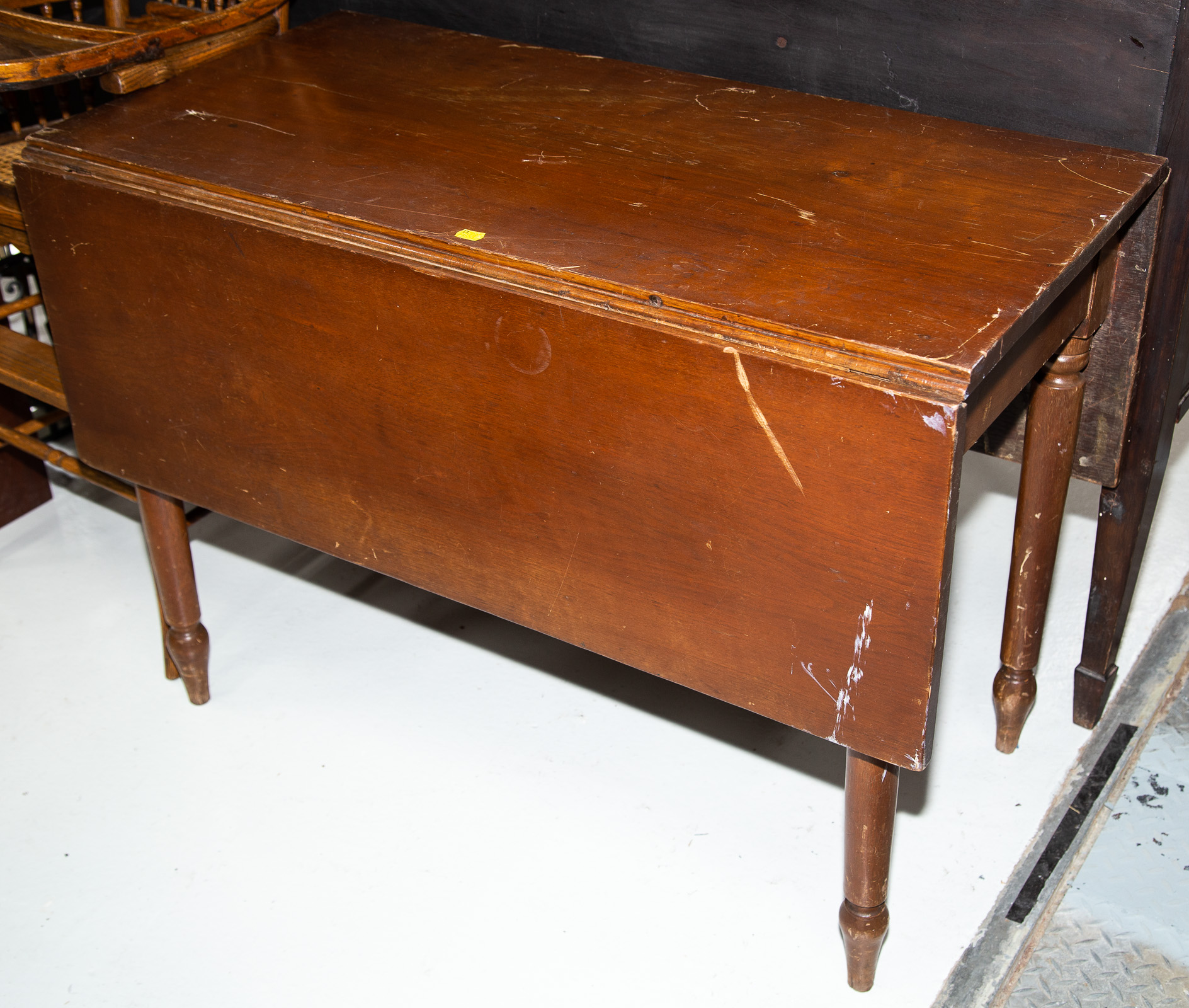 Appraisal: AMERICAN VERNACULAR WALNUT DROP LEAF TABLE st half th century