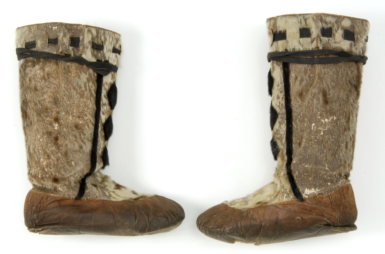 Appraisal: PAIR OF ESKIMO MUKLUKS Early th CenturyMade of sealskin and