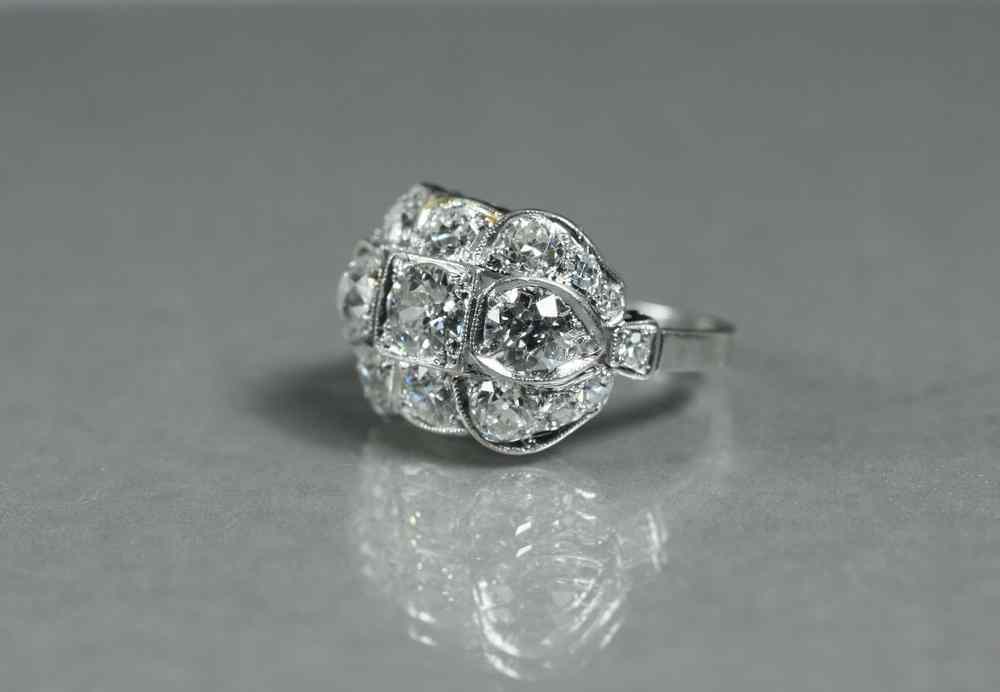 Appraisal: LADY'S RING - Ca platinum and diamond cluster ring set