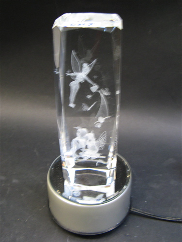 Appraisal: CRYSTAL SHAPED COLUMN having interior engraved wood nymphs one watering